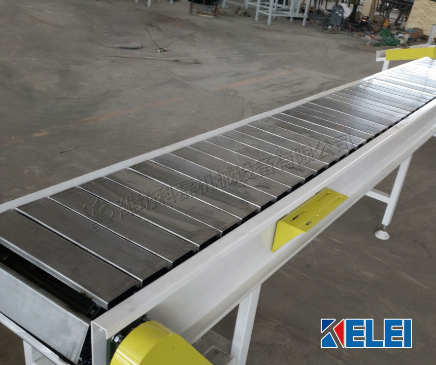 襄阳用(yòng)裕橡胶制(zhi)造有限公(gong)司鏈闆式(shì)輸送機